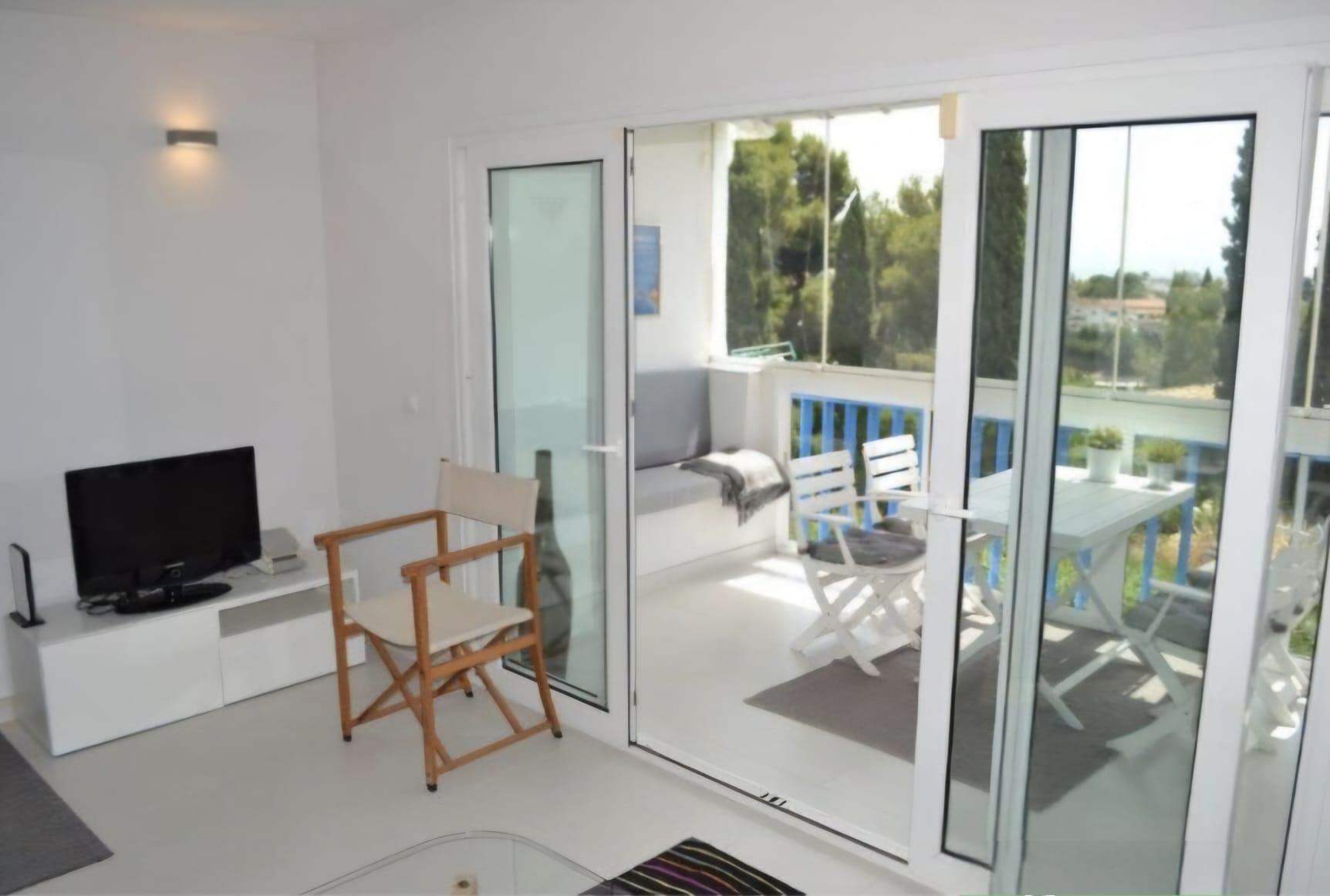 Piso con terraza acristalada y vistas al mar en Campo de Mijas